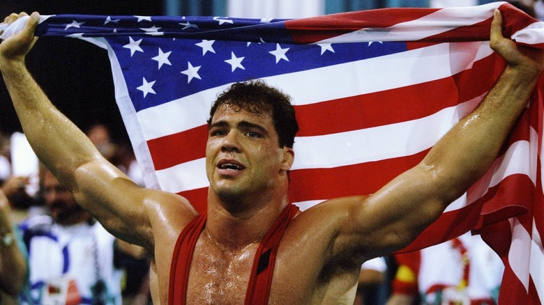 Kurt Angle holding American flag