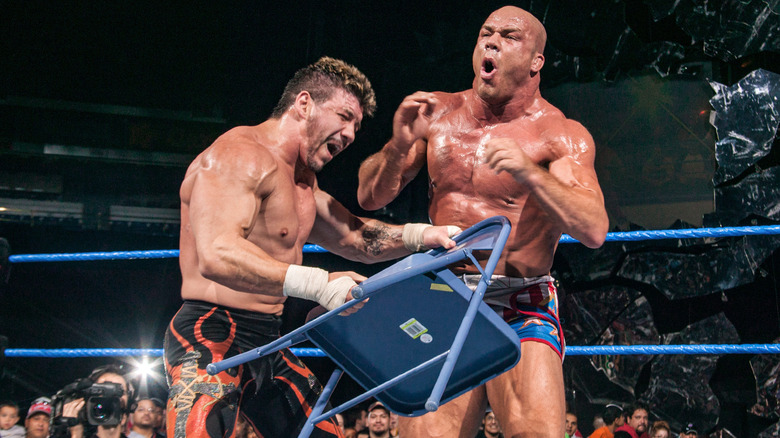 Eddie Guerrero hitting Kurt Angle with a chair