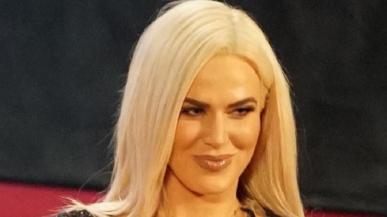 Titus O'Neil, Natalya and Mojo Rawley attend a Tampa Bay