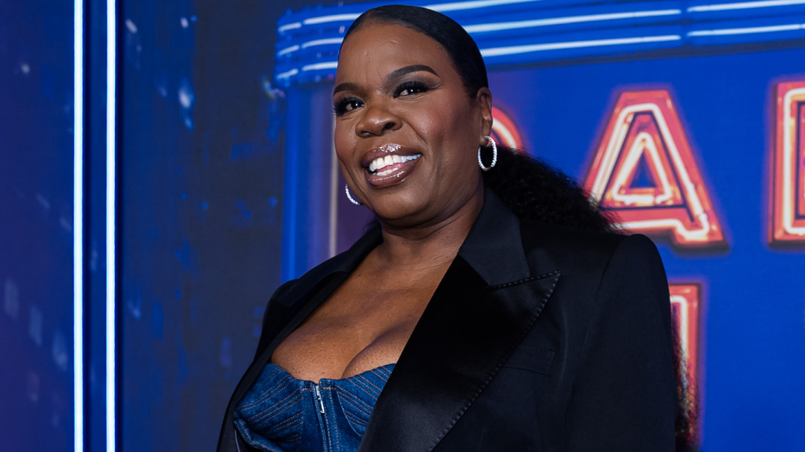 Leslie Jones Attends AEW Revolution, Takes Photo With Top Tag Team Backstage