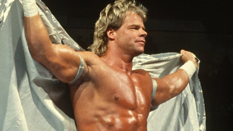 Lex Luger holding a silver cape