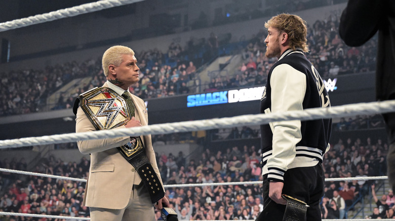 Cody Rhodes and Logan Paul face each other in WWE ring