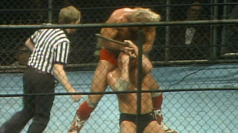 Magnum TA fights Tully Blanchard in cage