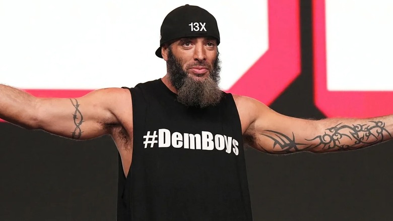 Mark Briscoe taunts his opponent at the top of a ROH entrance ramp