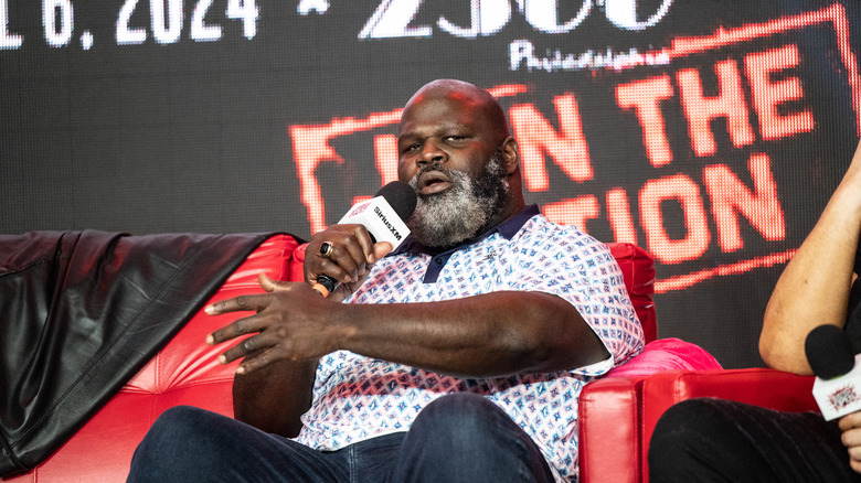 Mark Henry on a couch