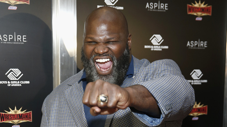 Mark Henry, punching you in the face