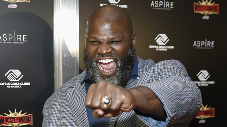 Mark Henry, punching you in the face