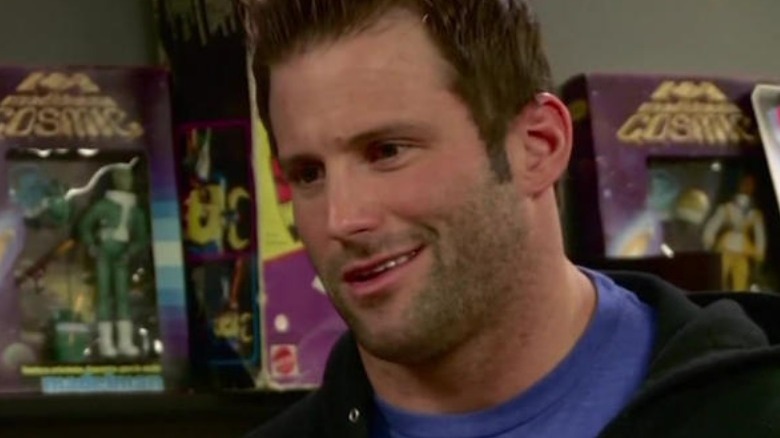 Zack Ryder in front of toys