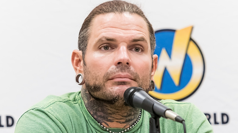 Jeff Hardy wears a green T-shirt