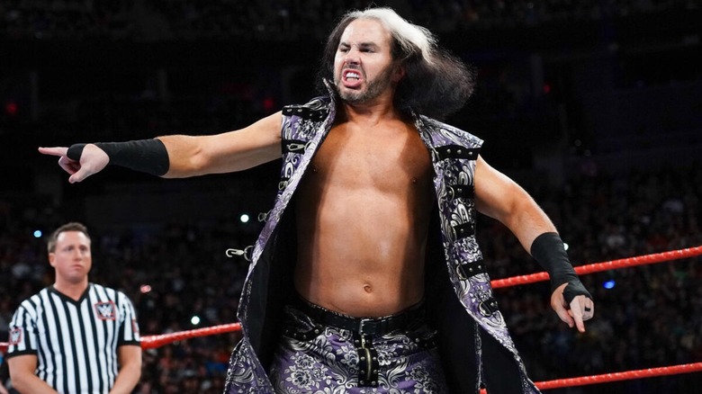 Matt Hardy in the ring, performing his signature "Delete" taunt