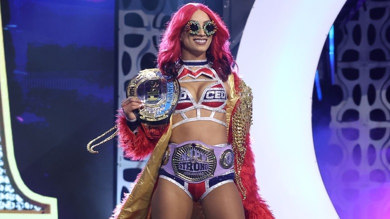 Mercedes Mone with title belts