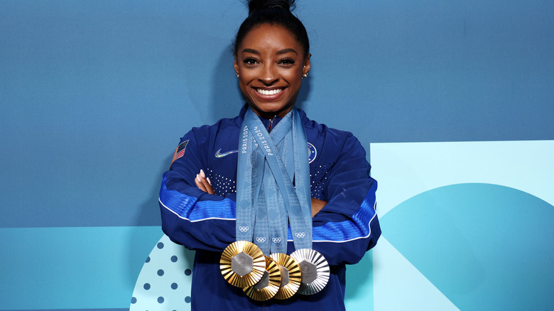 Simone Biles with gold medals