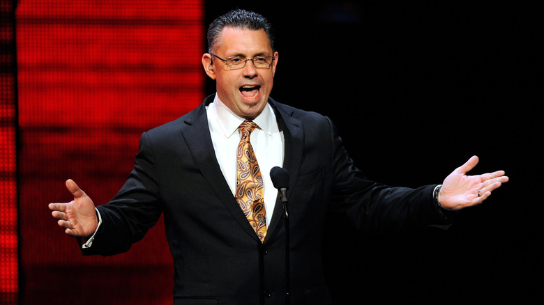 WWE commentator and host Michael Cole speaks at a news conference announcing the WWE Network at the 2014 International CES at the Encore Theater at Wynn Las Vegas on January 8, 2014 in Las Vegas, Nevada. The network will launch on February 24, 2014 as the first-ever 24/7 streaming network, offering both scheduled programs and video on demand. The USD 9.99 per month subscription will include access to all 12 live WWE pay-per-view events each year. CES, the world's largest annual consumer technology trade show, runs through January 10 and is expected to feature 3,200 exhibitors showing off their latest products and services to about 150,000 attendees.