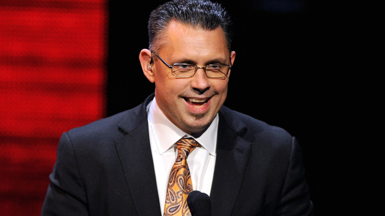 Michael Cole wearing glasses