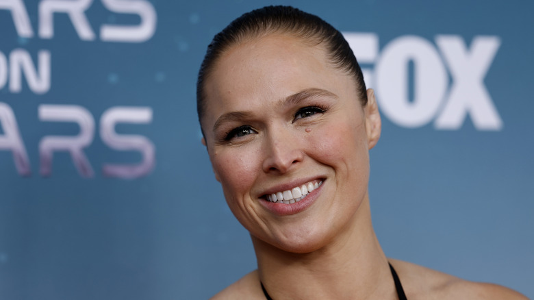 Ronda Rousey poses at a red carpet event