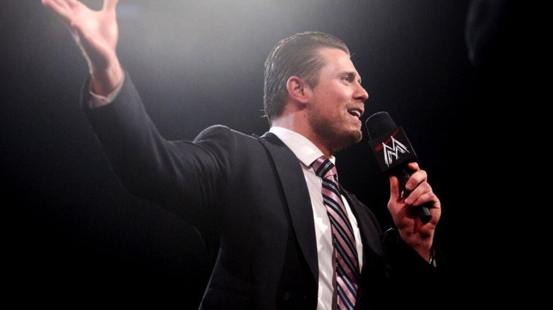 Mike "The Miz" Mizanin holds a microphone with his "M" logo in the ring while hosting an episode of "Miz TV."