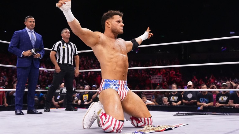 MJF poses in front of American title