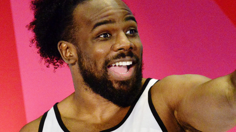 Xavier Woods smiles