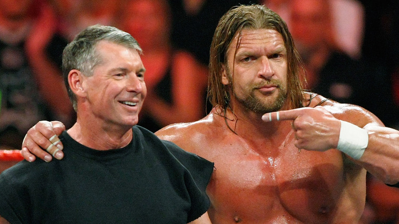 triple h pointing at vince mcmahon