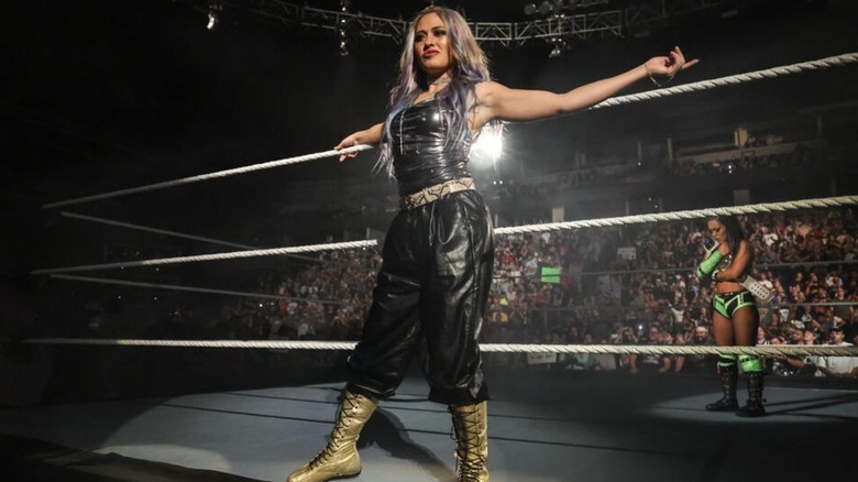 Giulia posing on the ring apron