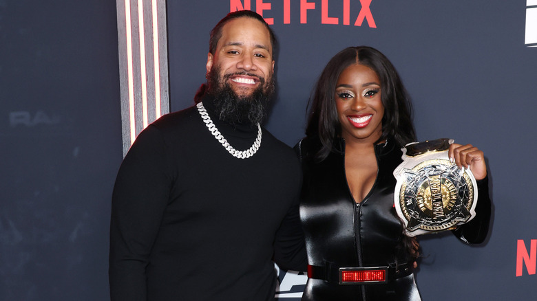 Jimmy Uso with Naomi on the red carpet