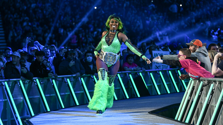 Naomi makes her entrance at the Royal Rumble