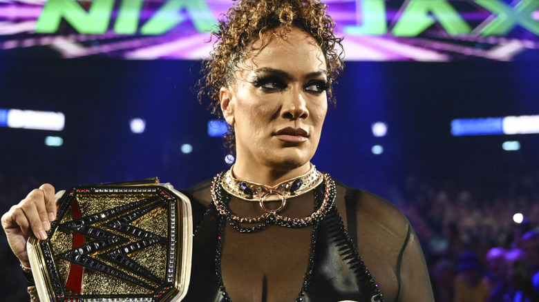 Nia Jax holding the WWE Women's Championship