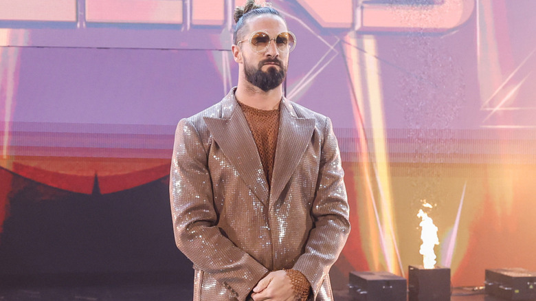 Seth Rollins wearing a sparkly brown jacket