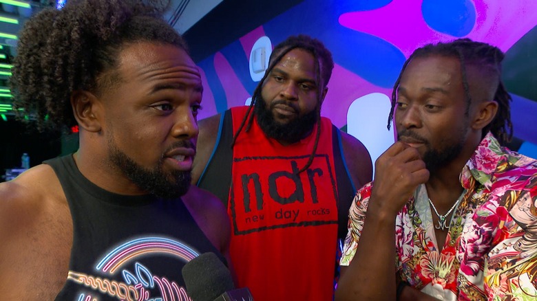 Xavier Woods, Odyssey Jones, and Kofi Kingston