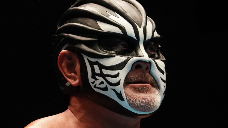 The Great Muta looking away