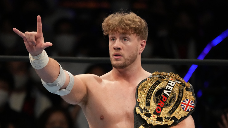 Will Ospreay with title belt