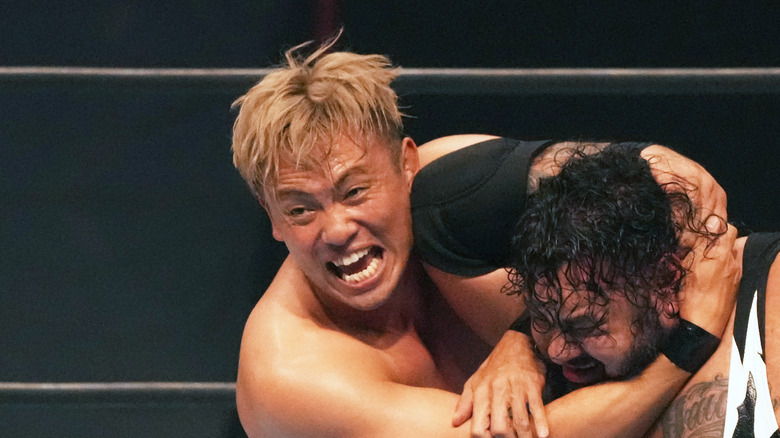 Okada applies the Money Clip