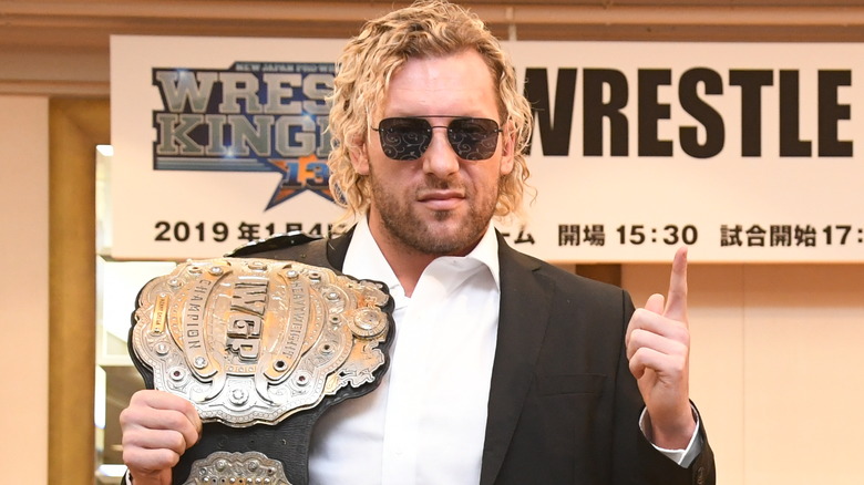 Kenny Omega posing