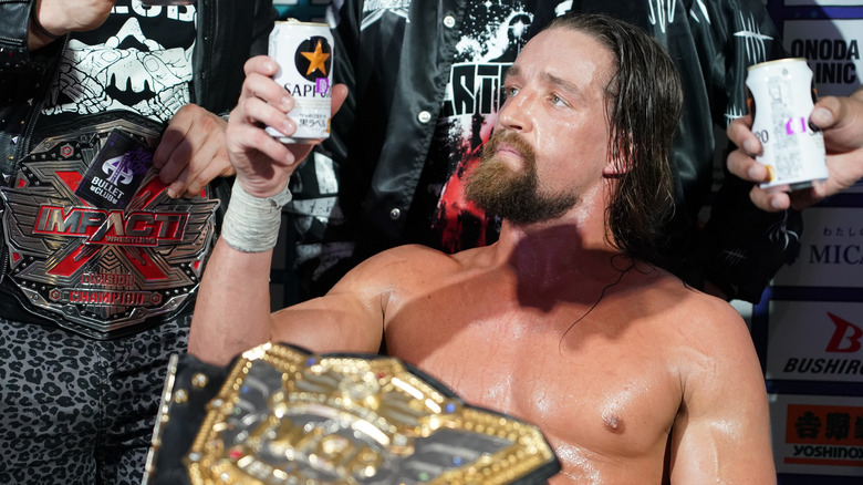 Jay White toasts to his title