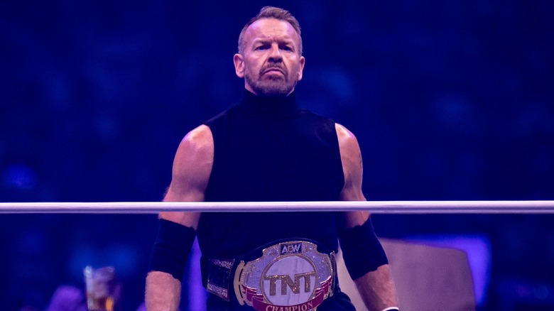 Christian Cage poses with title