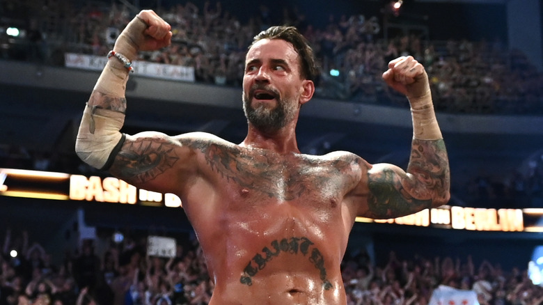 CM Punk flexes