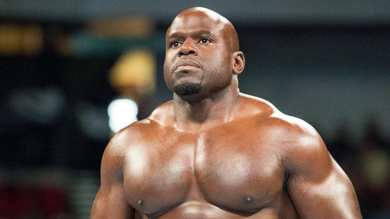 Apollo Crews posing in the ring 