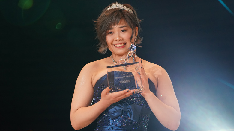 MIRAI holding 2022 Cinderella Tournament trophy