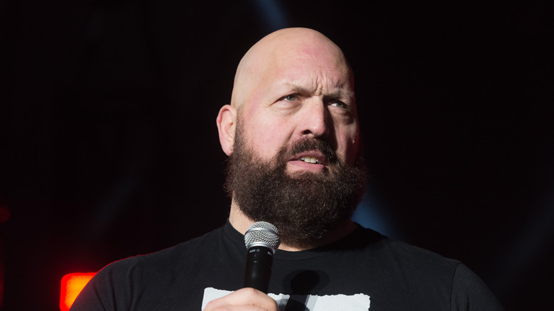 Paul Wight speaking with a microphone