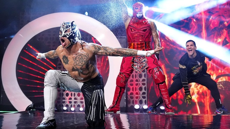 Rey Fenix, Penta El Zero Miedo, and Alex Abrahantes make their entrance.