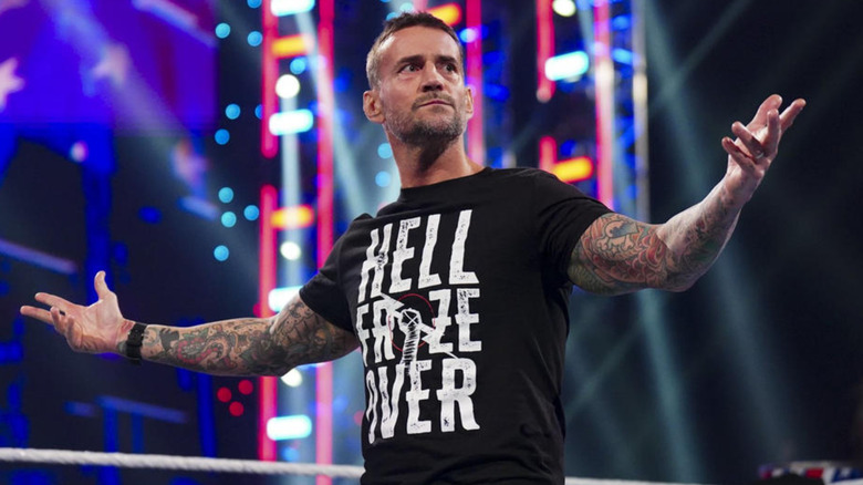 CM Punk wearing a black t-shirt