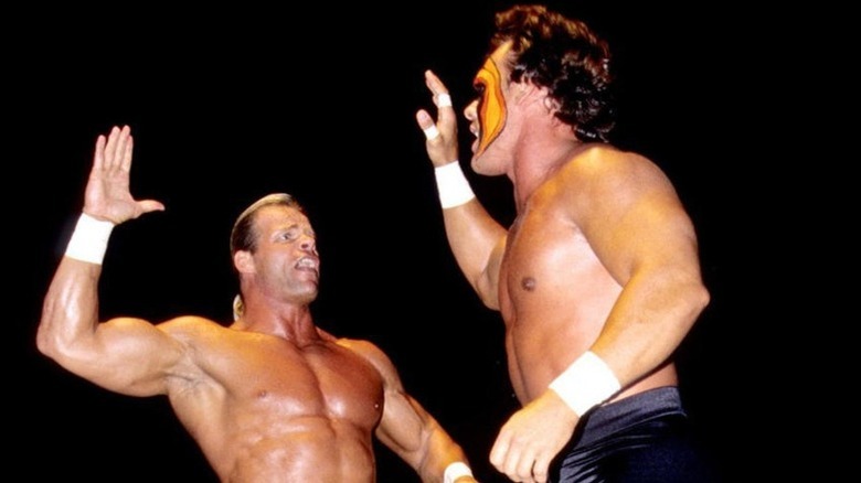 Sting and Luger high fiving 