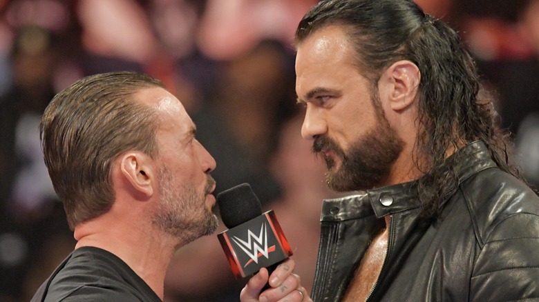 CM Punk and Drew McIntyre exchange words