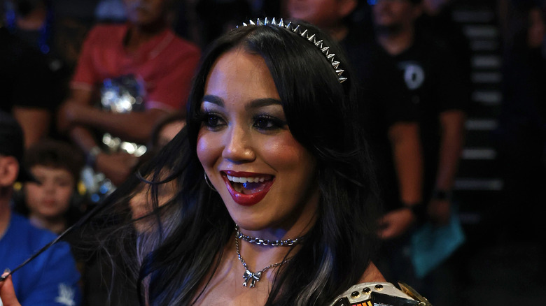 Roxanne Perez sitting front row, having a good time