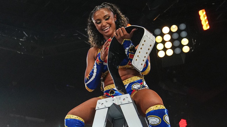 Kelani Jordan admires her new NXT Women's North American Championship.