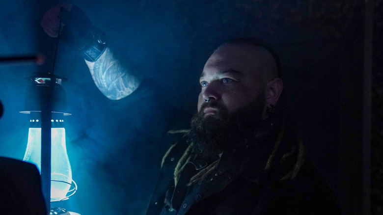 Bray Wyatt holds lantern