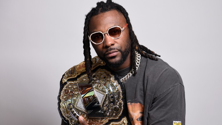 Swerve Strickland holding the AEW World Championship