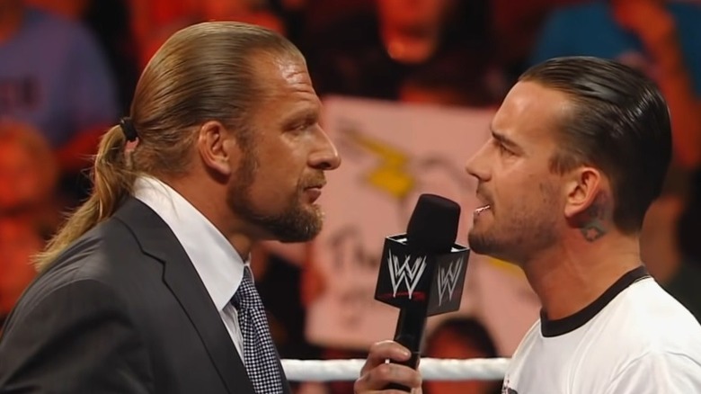 CM Punk talking to Triple H