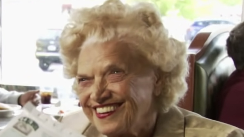 Mae Young smiles