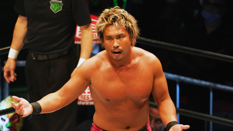 Katsuhiko Nakajima, right arm stretched out